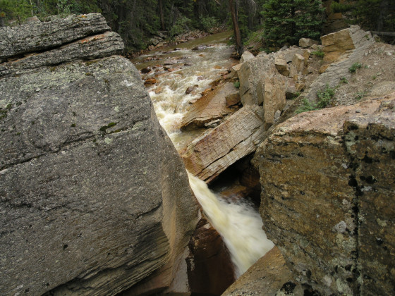 Powerful rushing water through the rocks